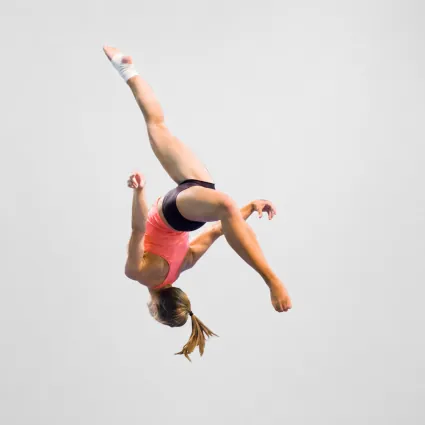 gymnast flip midair